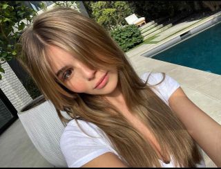 Olivia Jade with shiny brunette hair