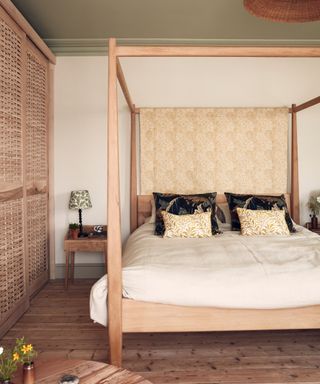 Neutral bedroom with Japandi influences and Morris fabric hanging from bed frame