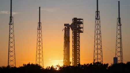 The Falcon 9 rocket and Dragon spacecraft that will fly the Crew-12 astronaut mission to the International Space Station for NASA stand on the launch pad at Cape Canaveral Space Force Station in Florida at sunset on Feb. 10, 2026.