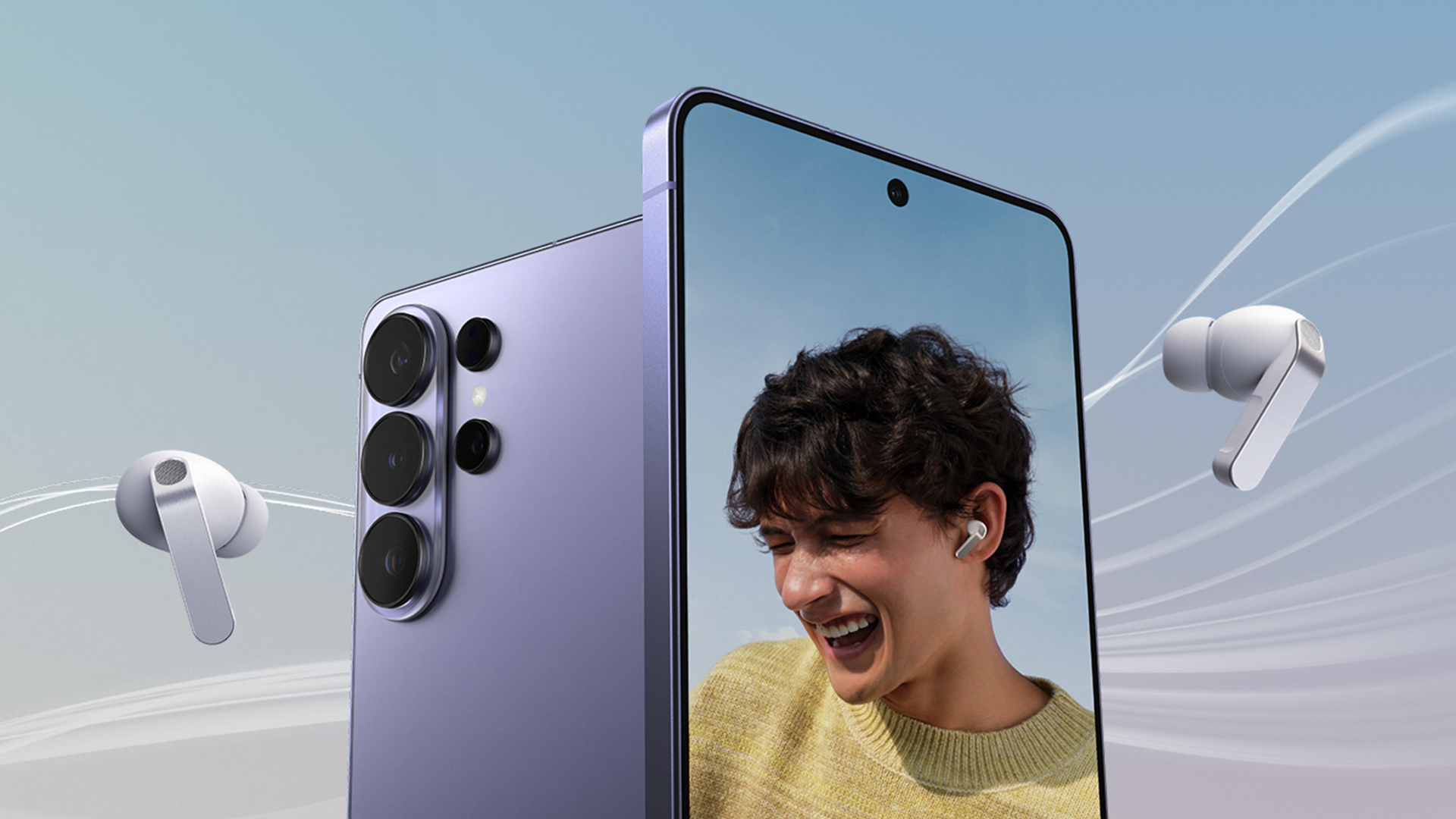 Two Samsung Galaxy S26 Ultra phones, one seen from the front with a smiling man displayed on the screen, one seen from the back, surrounded by two Samsung Galaxy Buds 3 Pro
