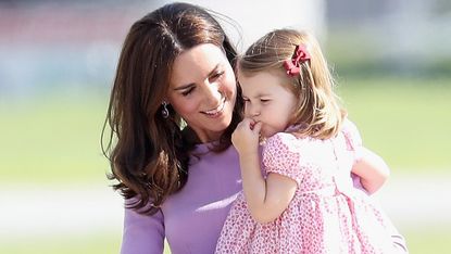 Princess Charlotte&#039;s household &#039;obsession&#039; revealed, seen here with Kate Middleton viewing helicopter models 