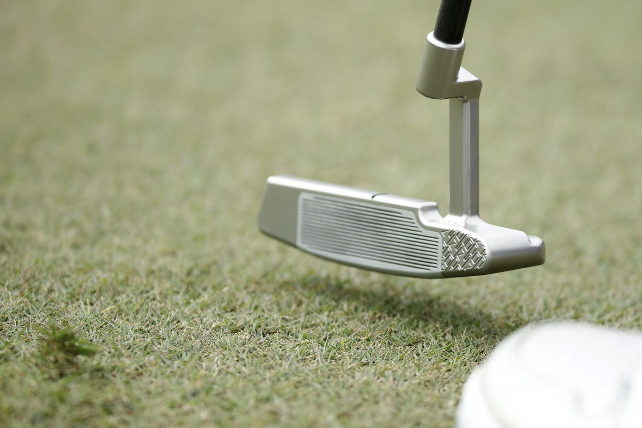 A close up of a Logan Olson putter used by Nelly Korda