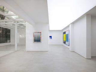 KennaXu Gallery with bright white spaces lit from above