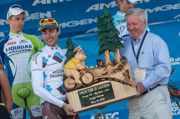 Sylvain Georges (AG2R La Mondiale) is presented with the winner's trophy at Big Bear Lake