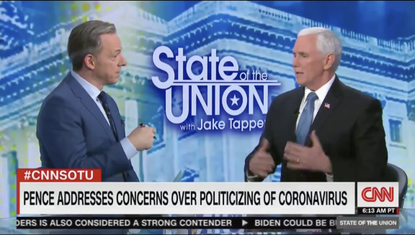 Jake Tapper and Mike Pence.