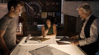 Paul Rudd, Evangeline Lily and Michael Douglas around a table in Ant-Man