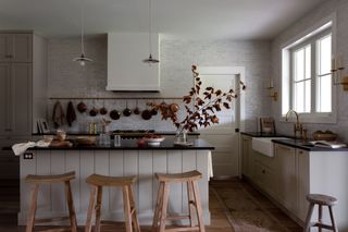 A kitchen with a wooden island
