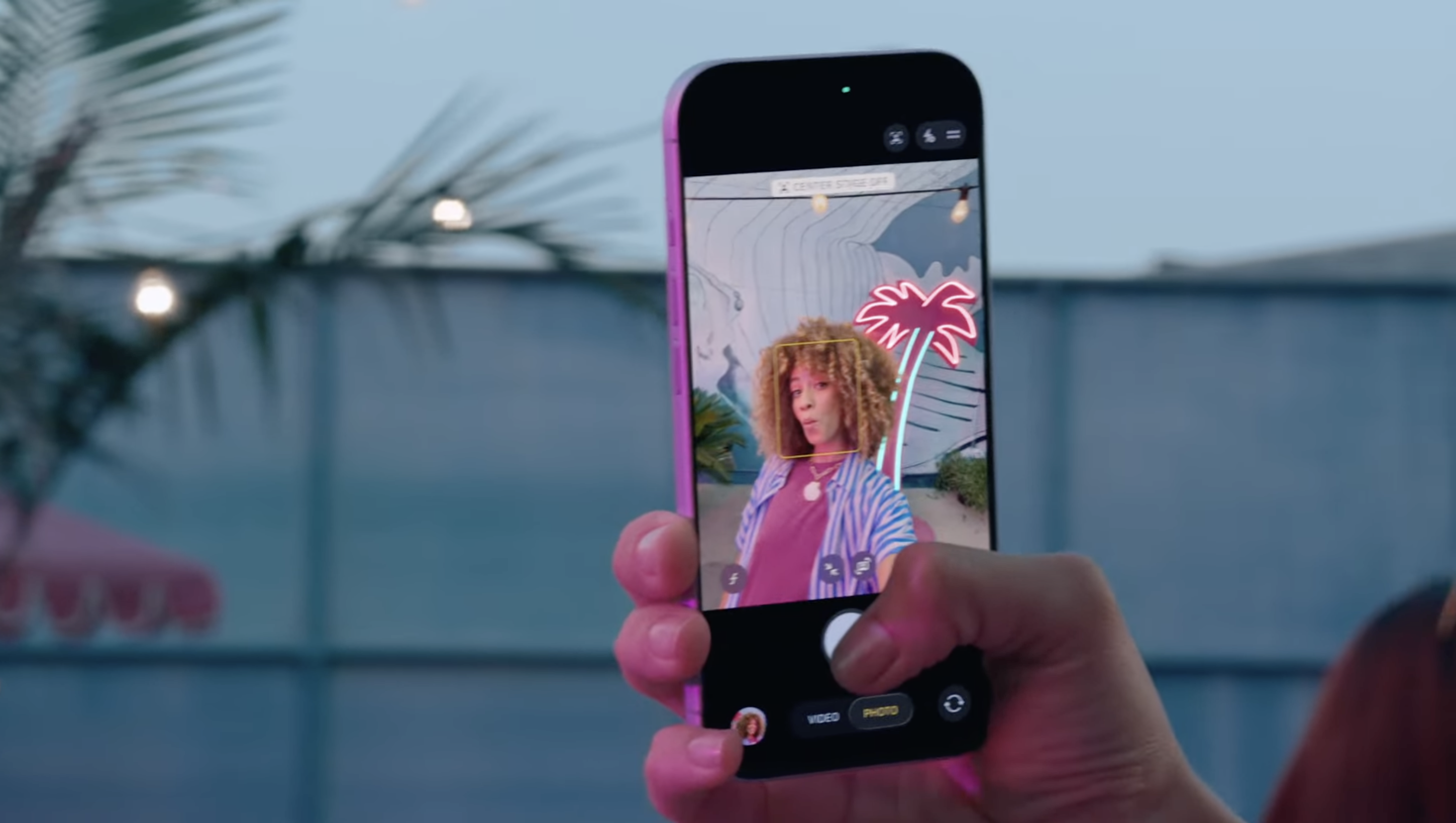 an image of a woman using the new iPhone 17 selfie camera