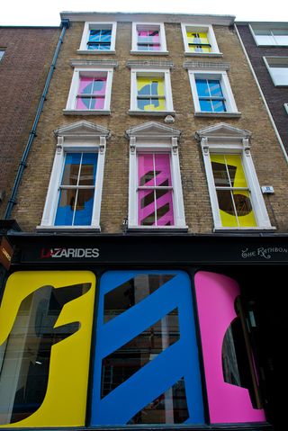 Maser also embellished the outside windows with colourful, geometric strips of vinyl.