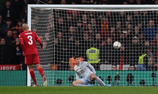 Fabinho scores a Panenka penalty past Kepa Arrizabalaga in Liverpool's shootout win over Chelsea in the 2022 EFL Cup final.
