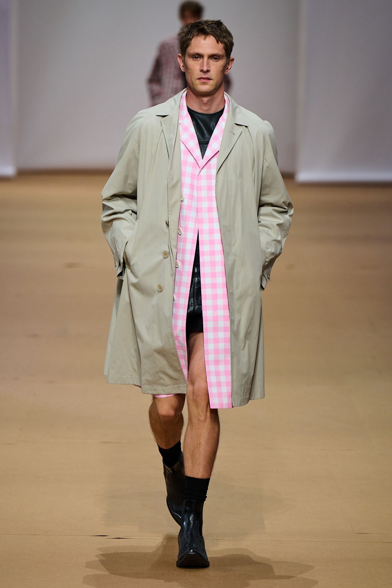 An image of gingham on the Prada SS23 runway.