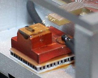 Another closeup. Notice the fiberoptic cable coming out of the chip.