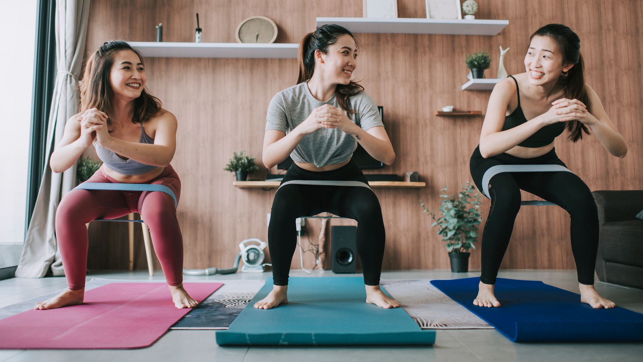 Three women in a line exercising