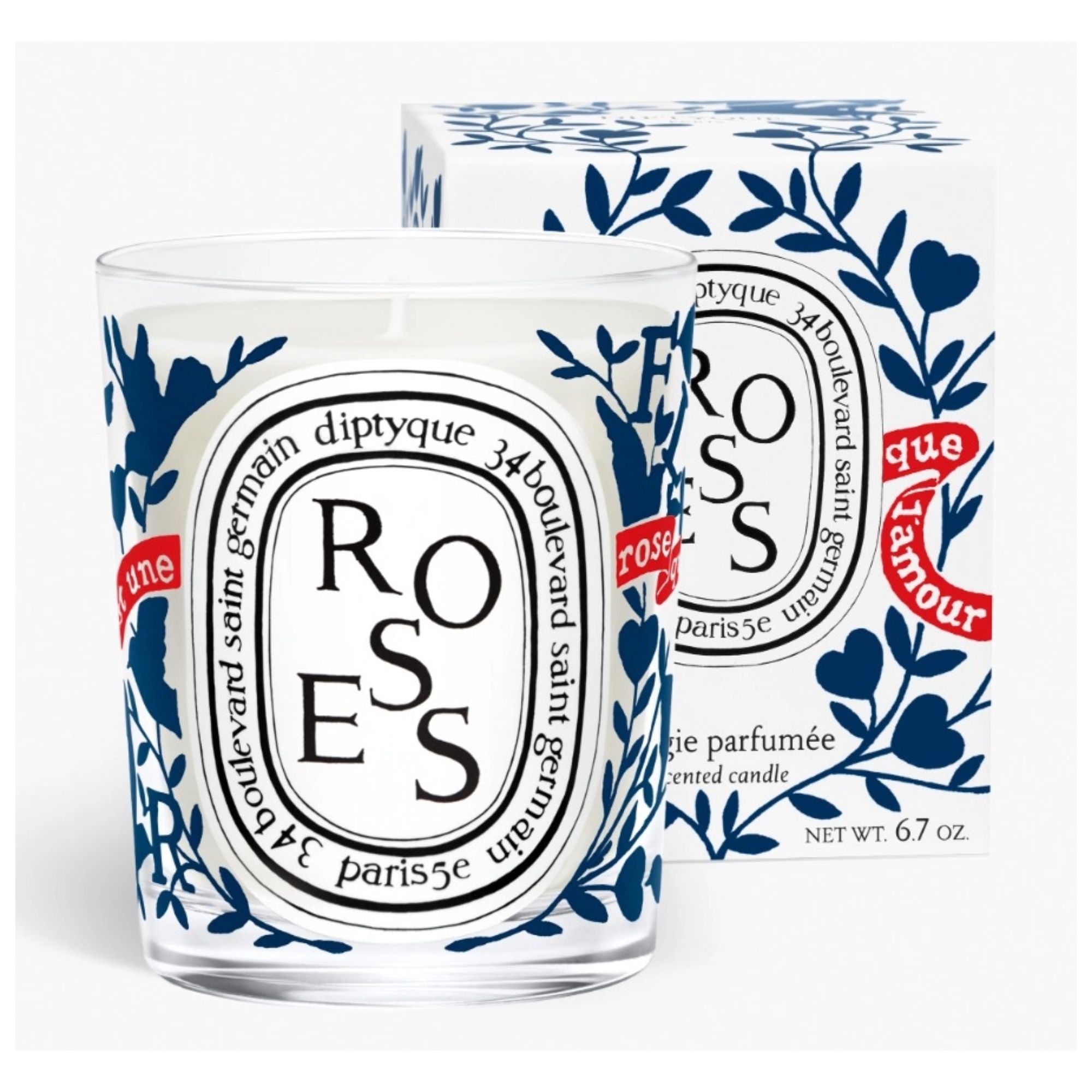 Diptyque Roses in a limited edition vessel with a blue floral pattern and red banner design