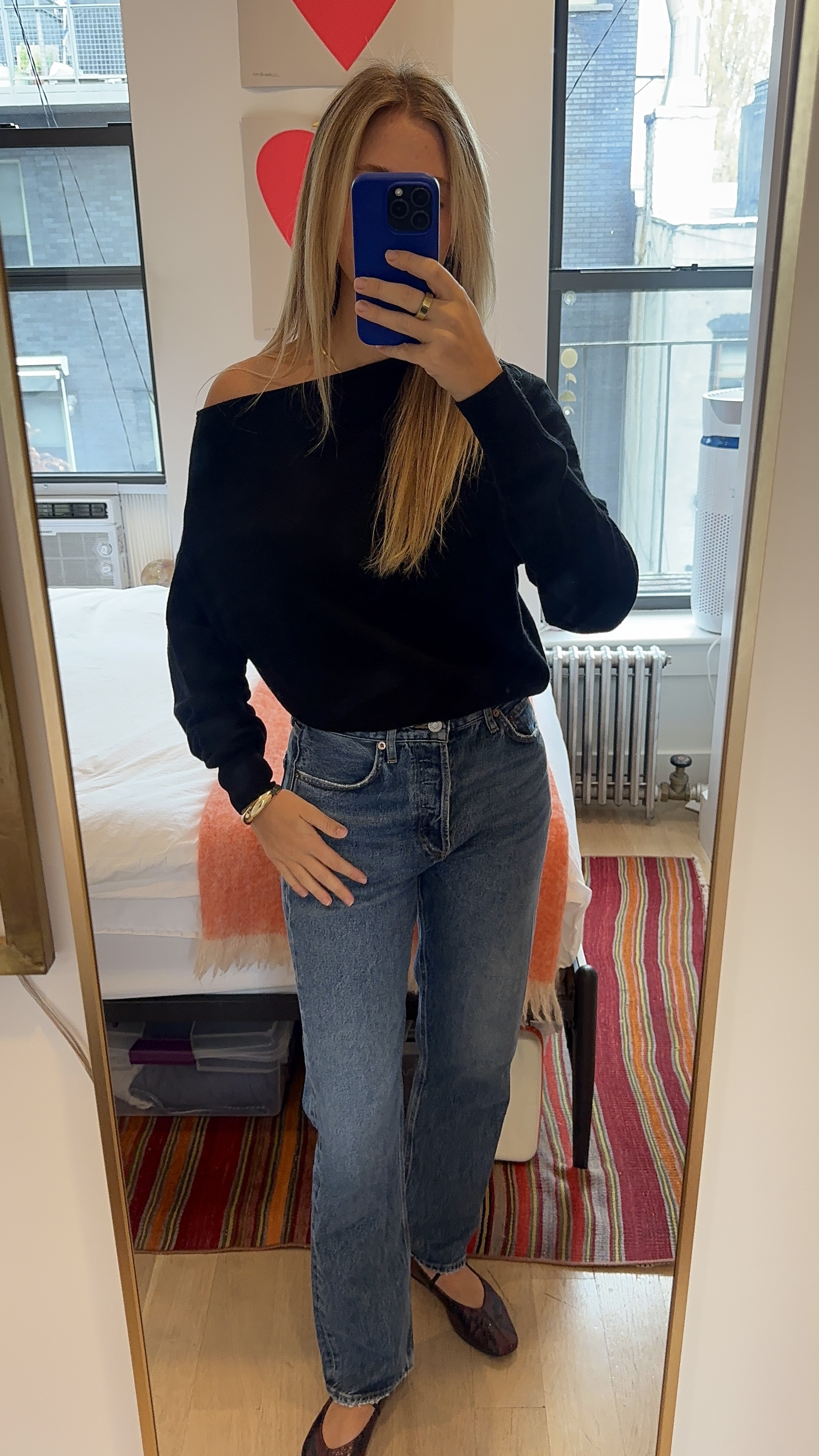 Bailey Burke in a cashmere sweater.