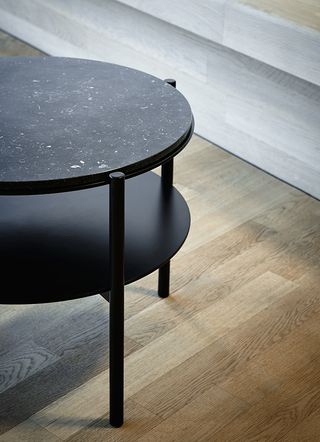 Black marble-topped side table