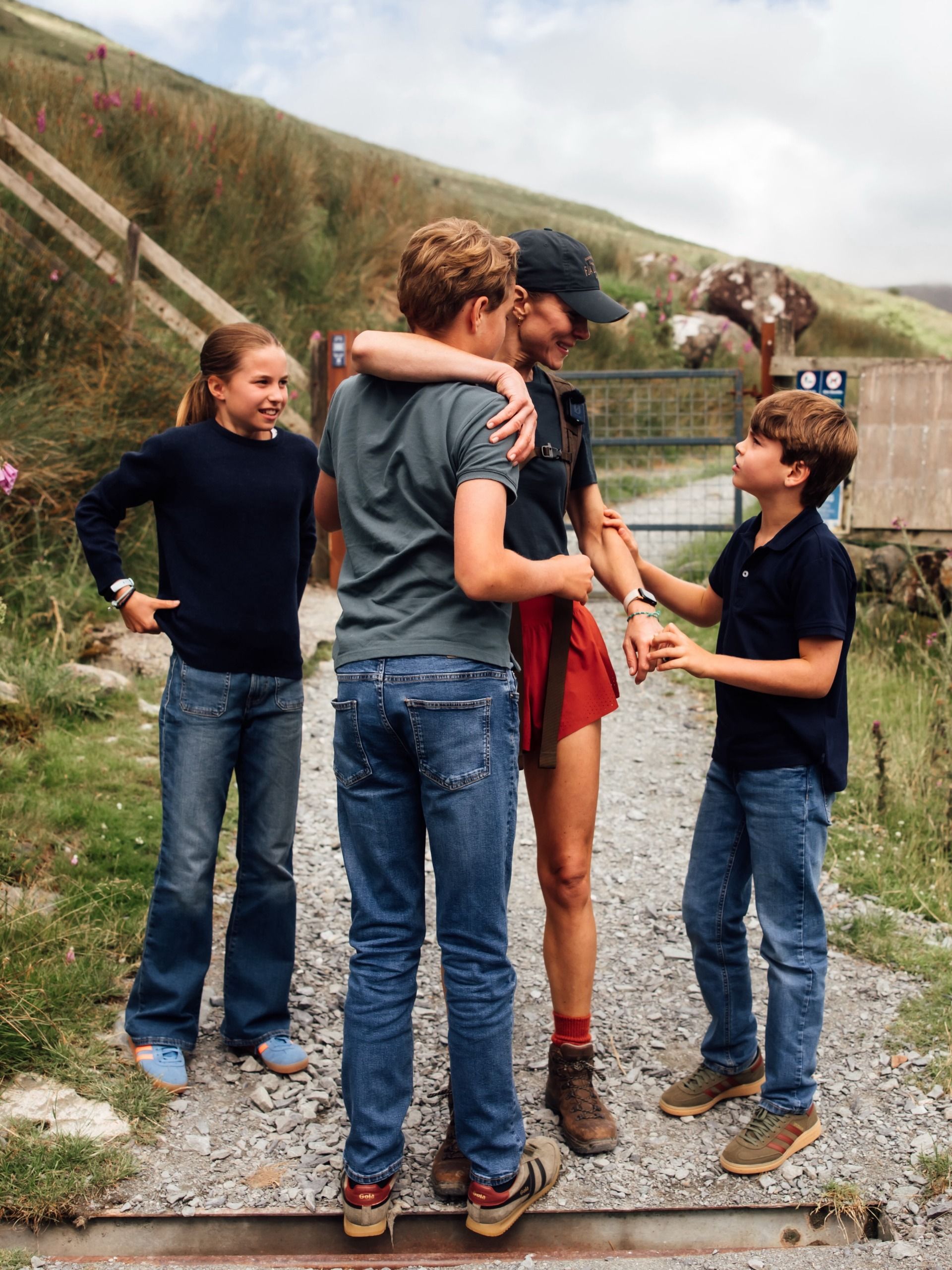 Prince George, Princess Charlotte, and Prince Louis appear in a previously unseen photo taken after their mom Princess Kate completed the Three Peaks Challenge