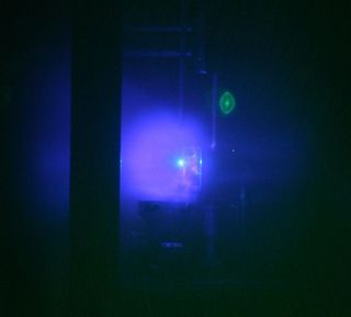 Physicists have created an explosion in the lab that mimics supernovas. Shown here, the light emitted as the shock wave of plasma expanded outward.