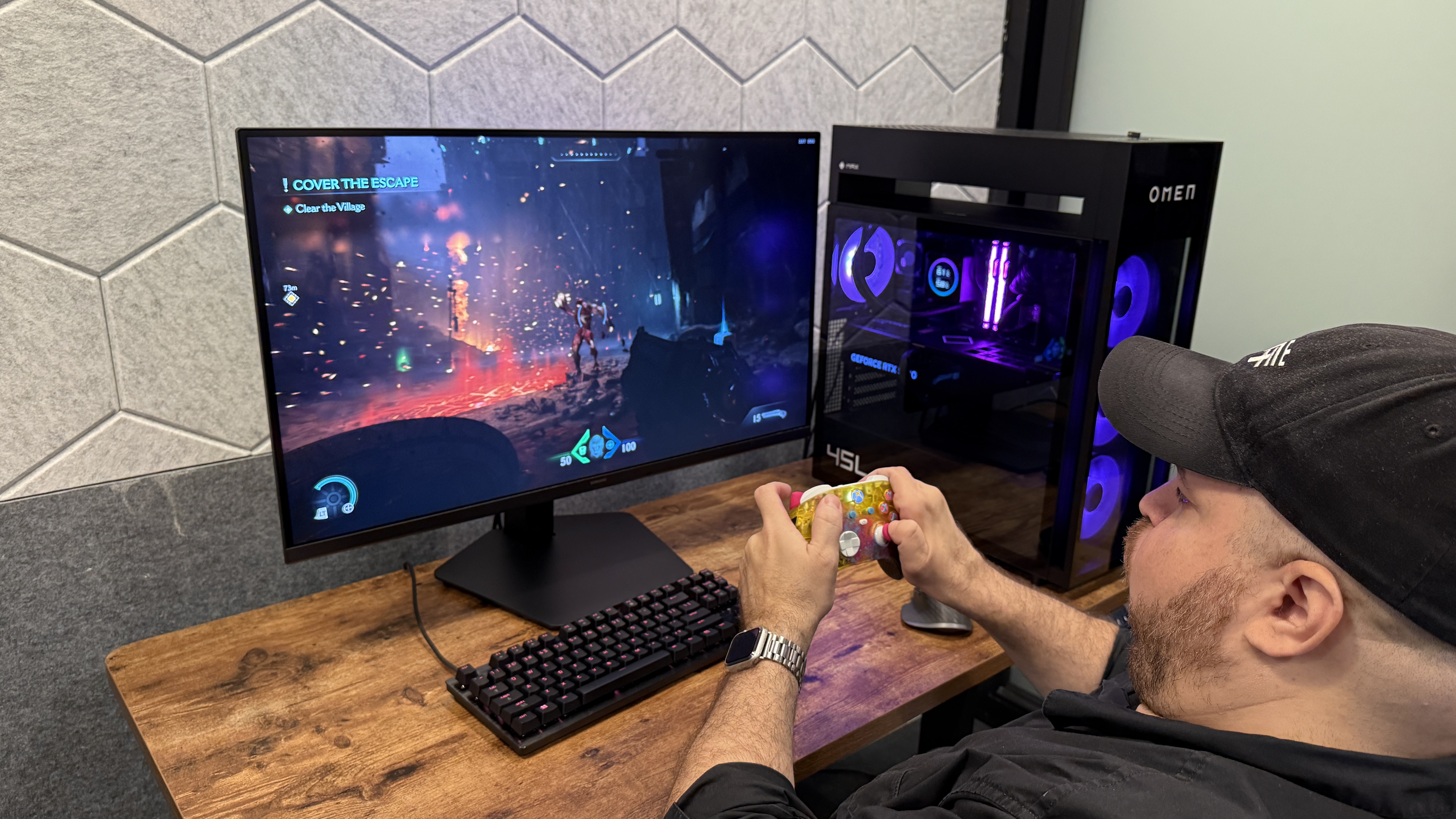 A person playing games on the Samsung Odyssey G8 (G80HS) monitor with an HP Omen gaming PC