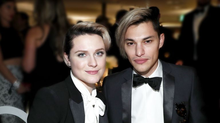 Hair, Suit, Formal wear, Hairstyle, Tuxedo, Fashion, Tie, Bow tie, Event, Smile,