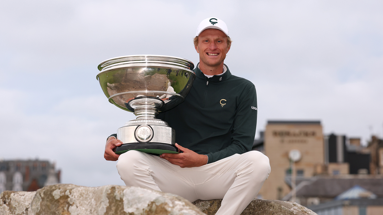 Adrian Meronk holds the Alfred Dunhill Links Championship trophy