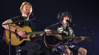 (L-R) FINNEAS and Billie Eilish perform onstage during the "Happier Than Ever Tour" at The Forum on April 08, 2022 in Inglewood, California