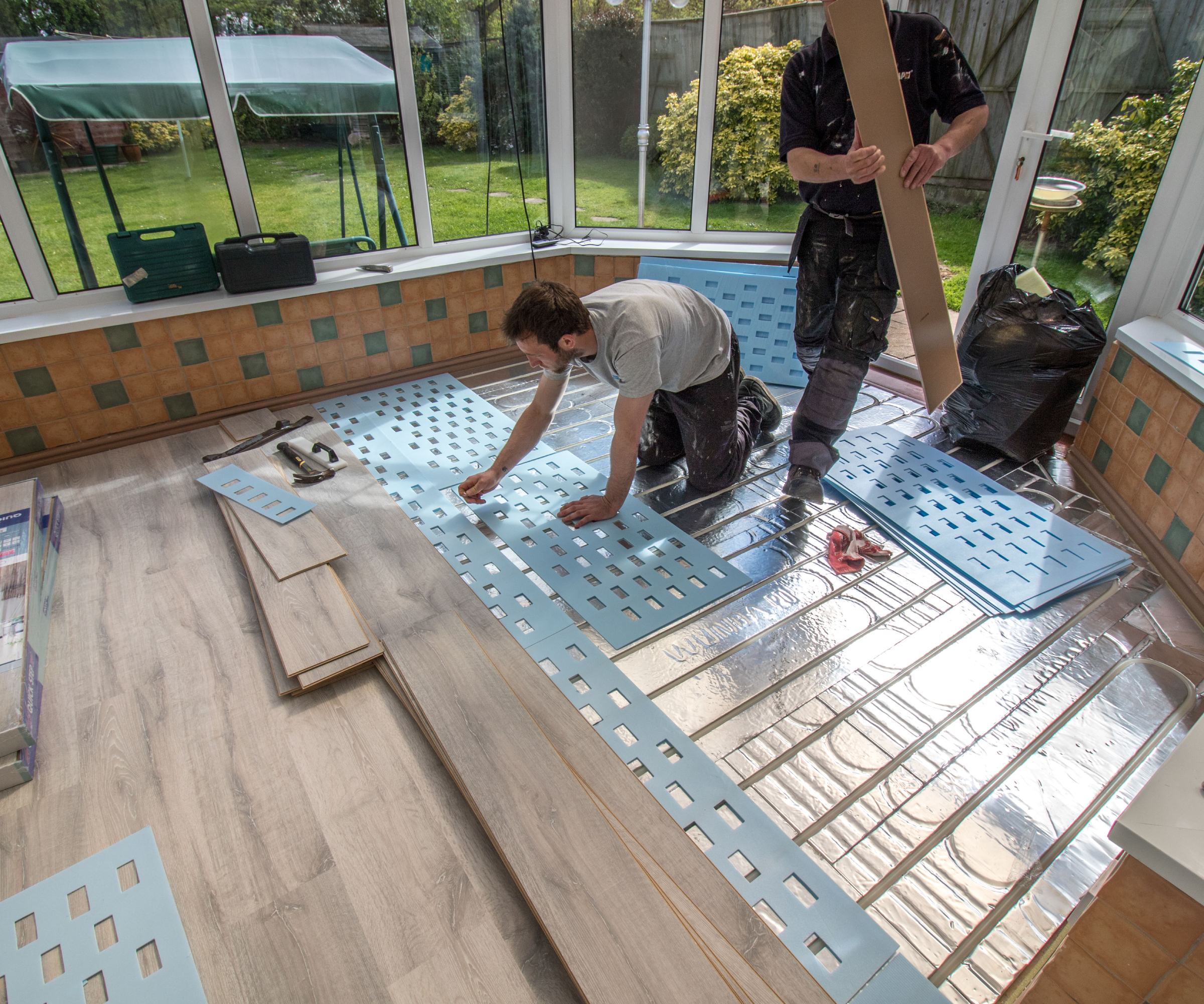 underfloor heating being installed in a conservatory