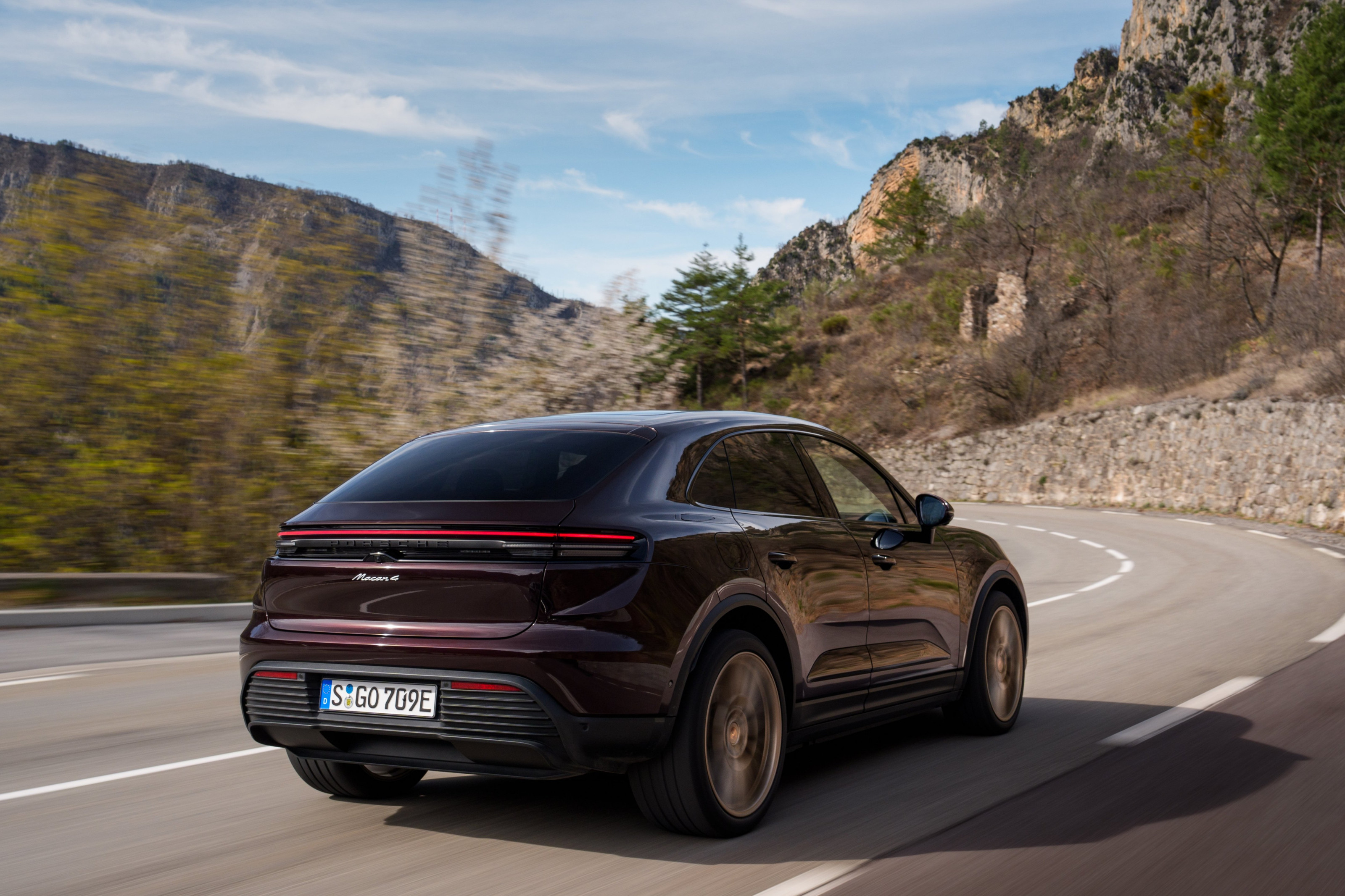 Porsche Macan Turbo EV in optional Copper Ruby Metallic paint
