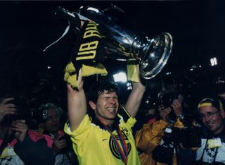 Andreas Moller celebrates with the European Cup after Borussia Dortmund's win over Juventus in the 1997 final.