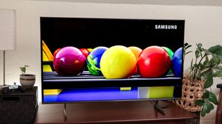 A Samsung DU7200 LED TV on a side table