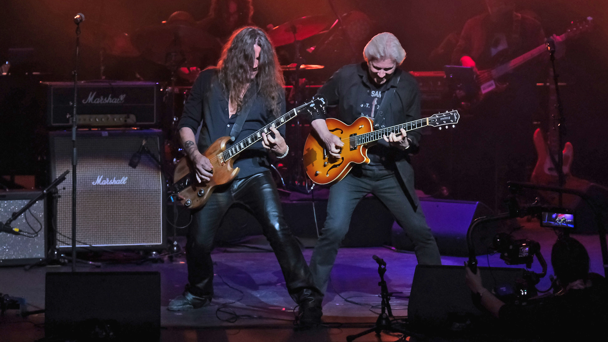 Rik Emmett of Triumph and Phil X of Bon Jovi perform on stage during the 2025 Canadian Songwriters Hall Of Fame Legends Induction at Meridian Arts Centre on October 17, 2025 in Toronto, Ontario.