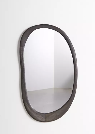  Asymmetrical wall mirror.