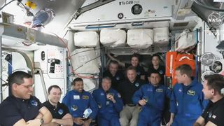 Crew-6 astronauts after their arrival at the International Space Station posing with their Crew-5 predecessors and three space travelers that arrived on Russia's M-22 mission.