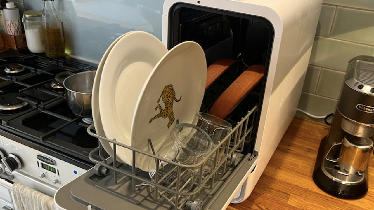 Image of dishes post wash in Loch Capsule countertop dishwasher