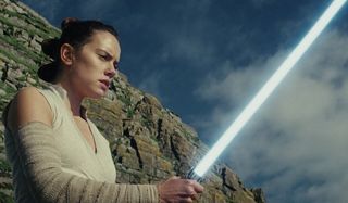 Star Wars: The Last Jedi Daisy Ridley Rey looks at Luke's lightsaber