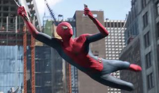 Spider-Man: Far From Home Peter checking his phone in costume as he swings around New York