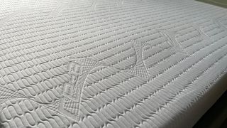 A close-up of the top cover for the REM-Fit Pocket 1000 Mattress review