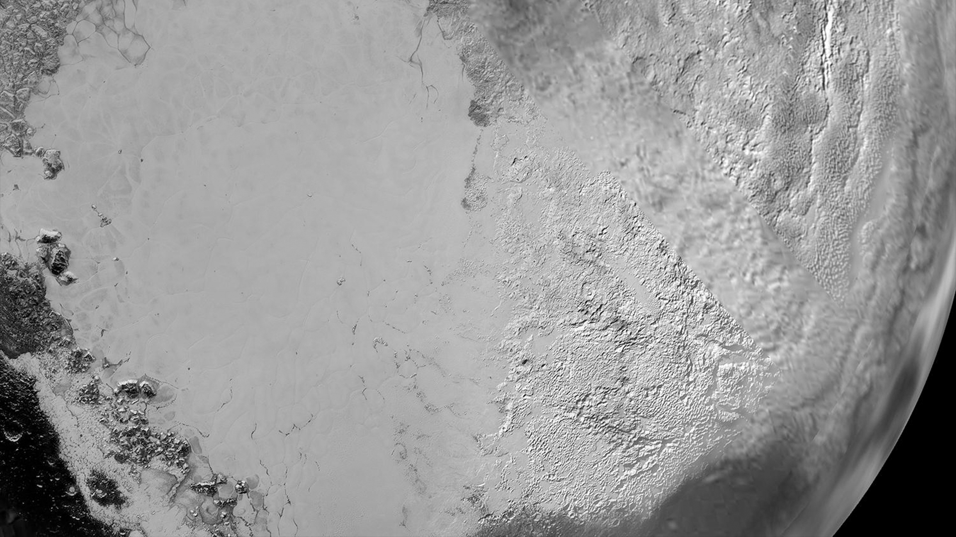 Sputnik Planum is the informal name of the smooth, light-bulb shaped region on the left of this composite of several of NASA New Horizons images of Pluto.