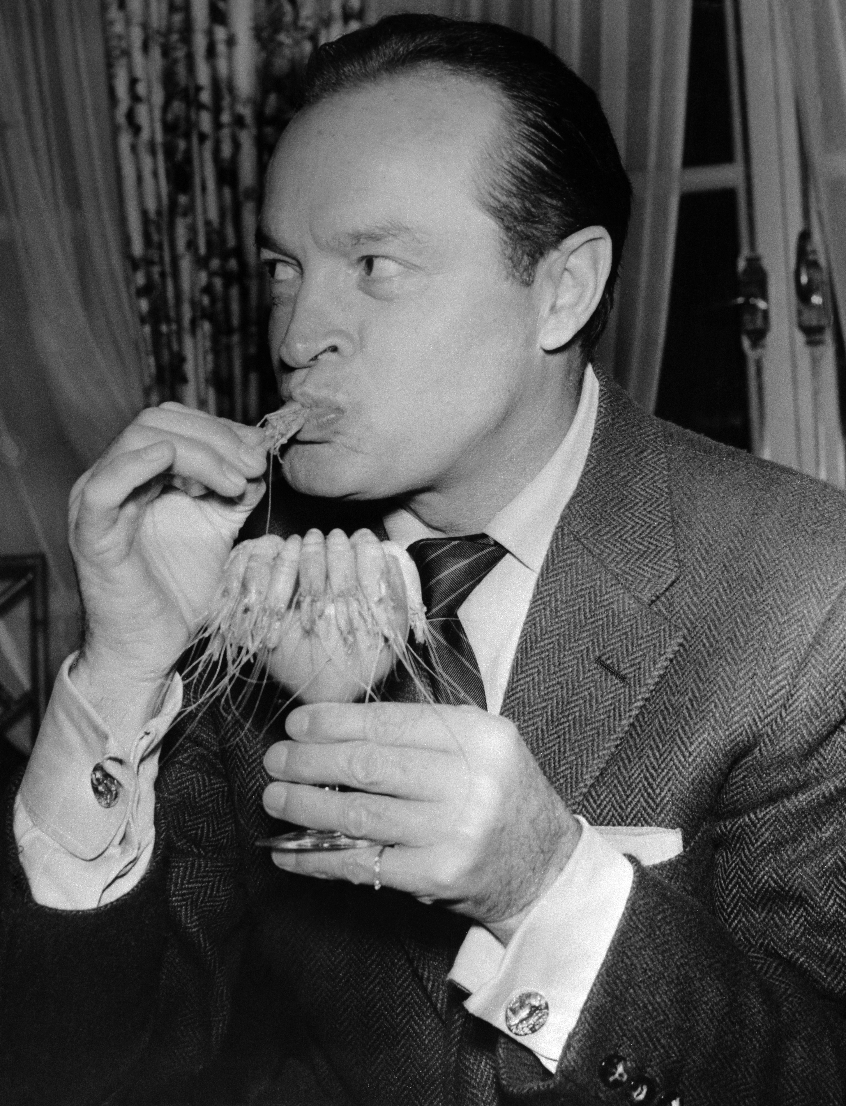 Bob Hope enjoying prawn cocktail