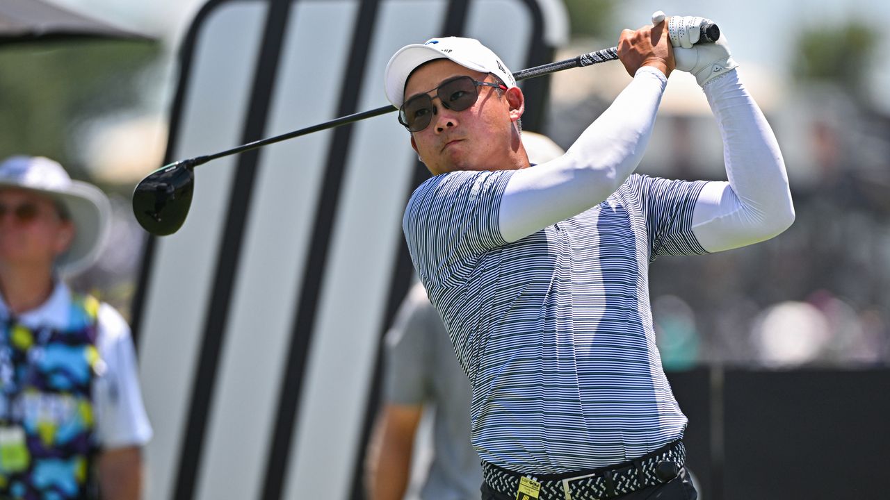 Chieh-po Lee holds his finish on a drive during a LIV Golf event