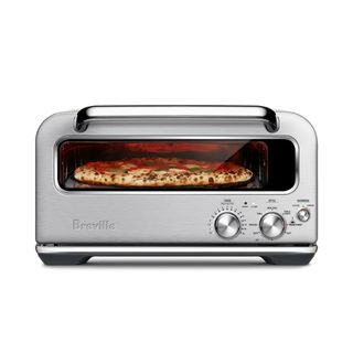 A Breville Smart Oven Pizzialo making a pizza