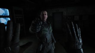 Trailer screenshot of the player being held at gunpoint by an enemy in Stalker 2.
