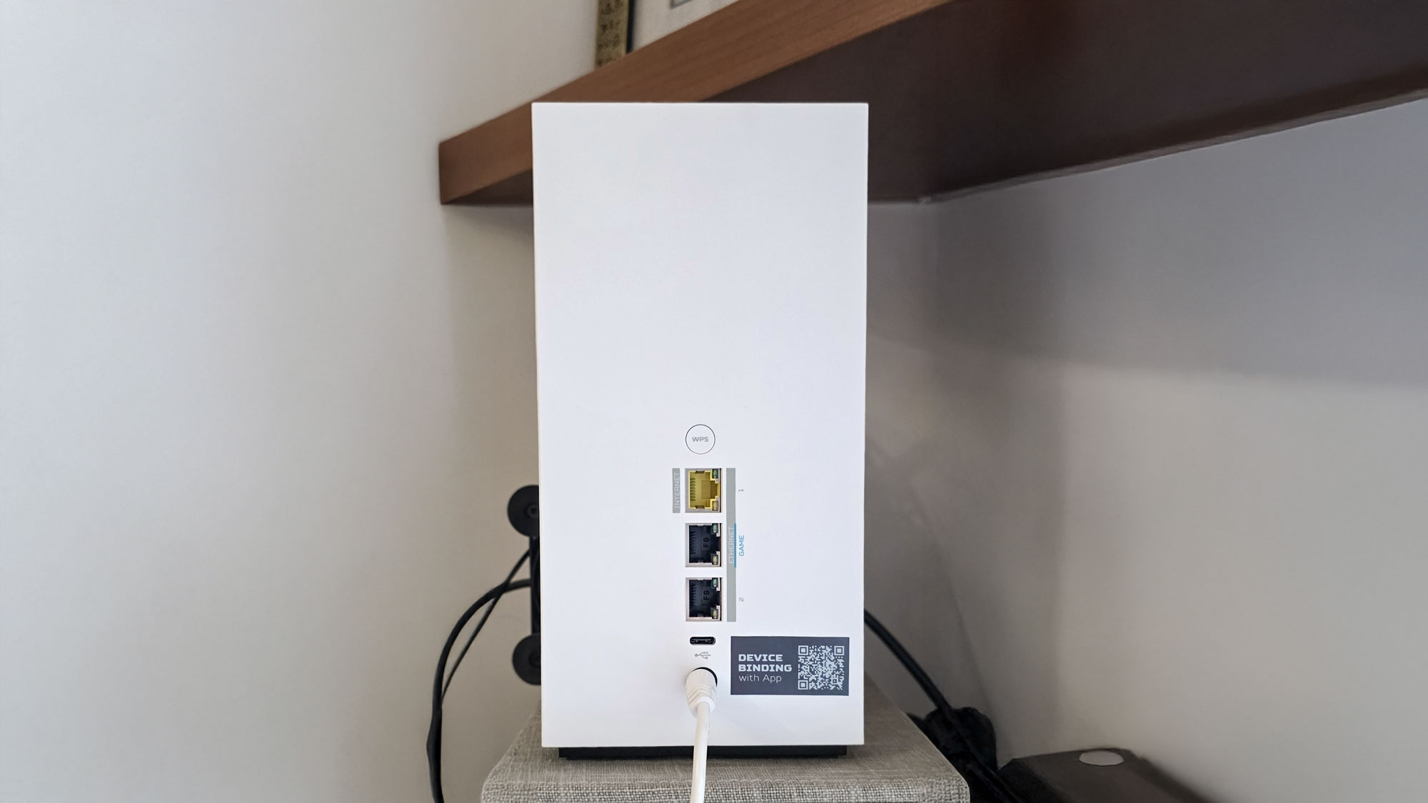 A photo of the back of an Acer Predator Connect T7 Wi-Fi 7 gaming mesh router.