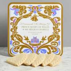 wedding card with biscuits and biscuit tin
