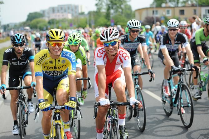 Riders give the race photographs a smile during the race