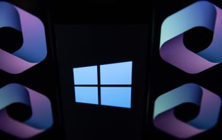 Microsoft Windows logo with Copilot logo on black background