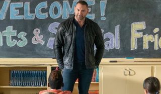 My Spy Dave Bautista speaking in front of a class of kids