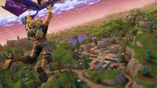A player glides down over Tilted Towers in Fortnite