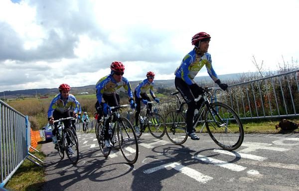 Rubens Bertogliati, right, leads his Team Type 1-Sanofi teammates up the La Redoute climb.