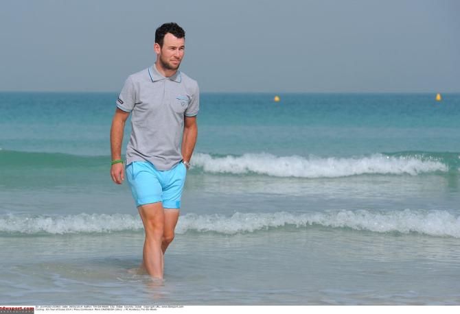 Mark Cavendish cools off in the sea